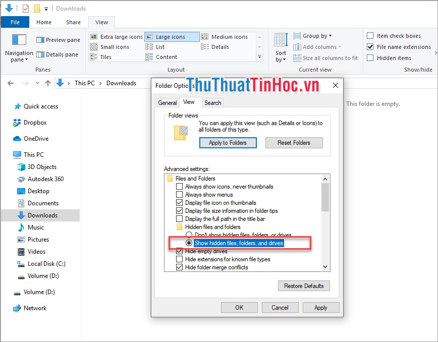 Chọn Show hidden files folders and drivers
