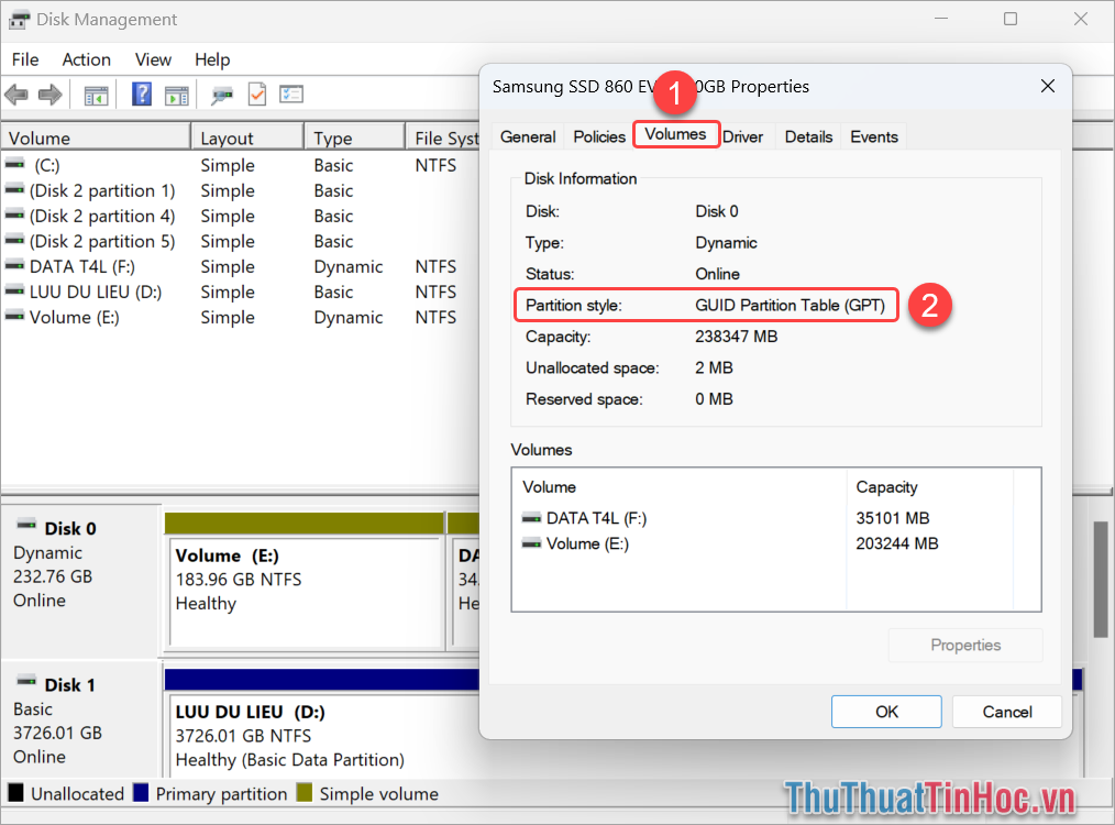 Chọn thẻ Volumes (1) và xem định dạng ổ cứng tại mục Partition Style (2)